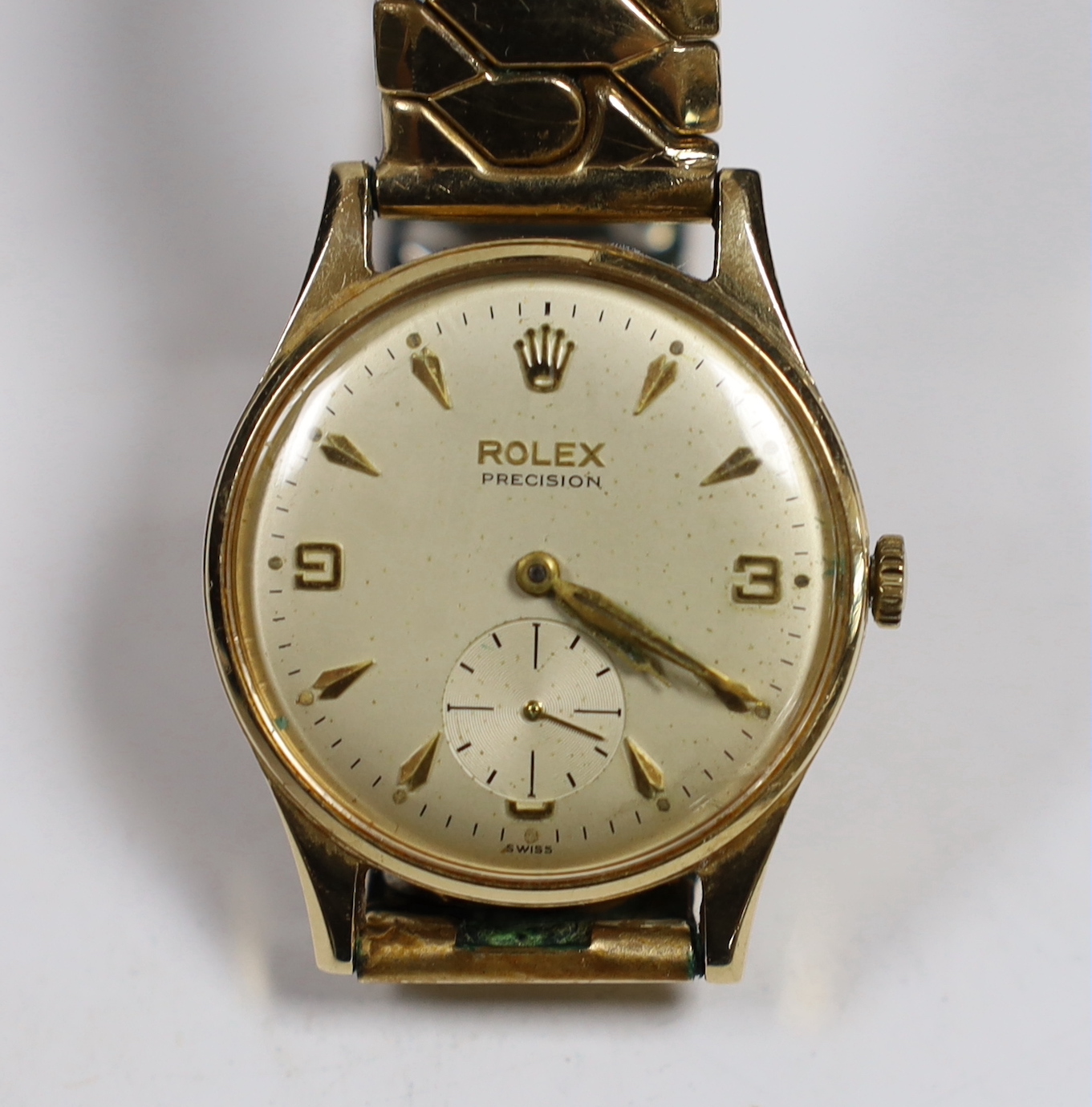 A gentleman's 1960's 9ct gold Rolex Precision manual wind wrist watch, with case back inscription, on associated flexible strap, case diameter 32mm.